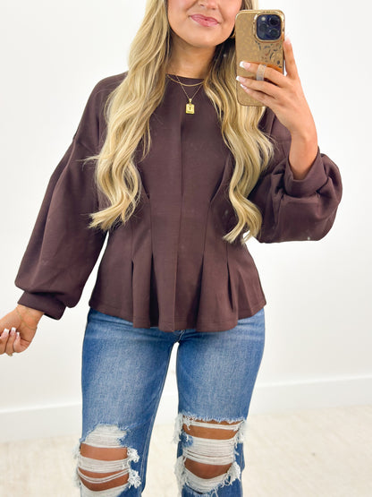 Plum gathered long-sleeve peplum top, round neck, puff sleeves
