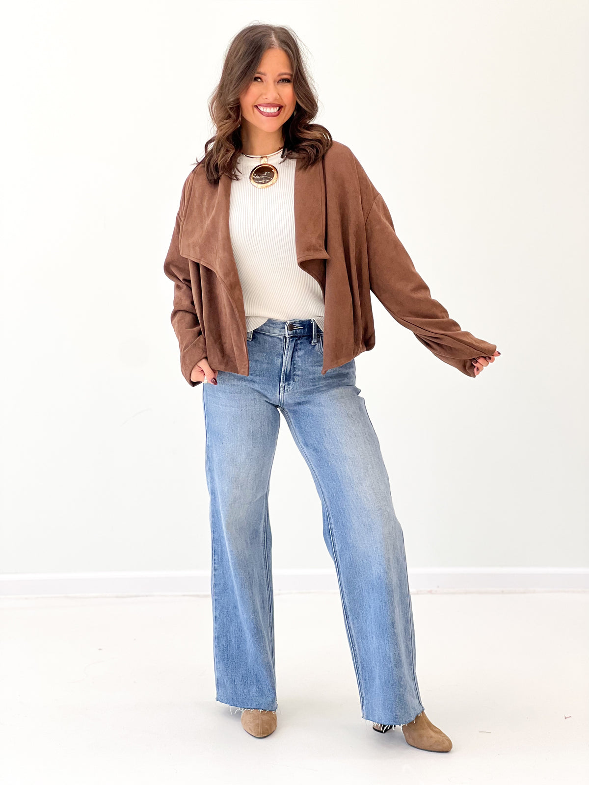 Brown suede collared jacket with open front and patch pockets
