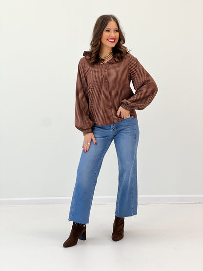 Burgundy plaid ruffle-collar blouse with long sleeves and gathered detail