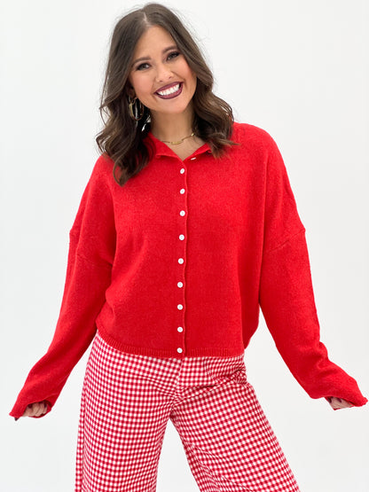 Red button-front long-sleeve cardigan with point collar and front buttons