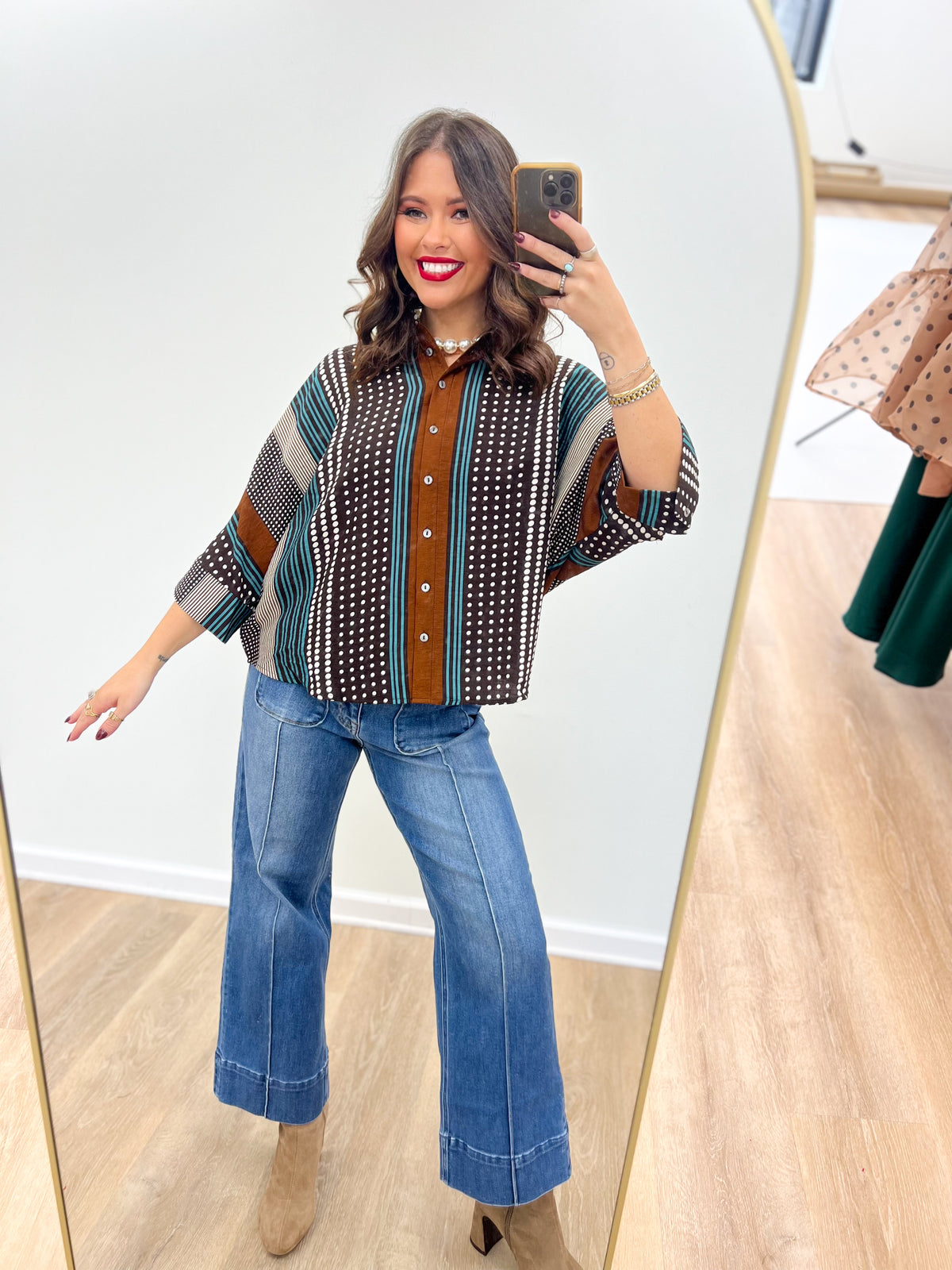 Brown mixed-print stripe shirt with collar, button placket, short sleeves, teal side stripes