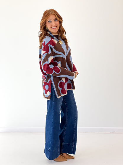Multicolor floral print crewneck sweater top with loose hem and long sleeves