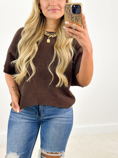 Brown short-sleeve knit sweater top with crew neck, close-up fit