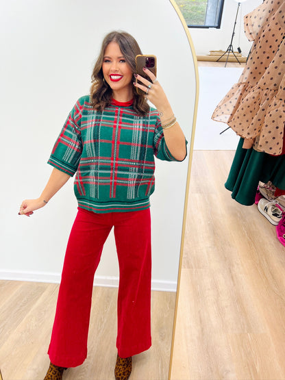 Hunter green plaid short-sleeve sweater top with red and white grid pattern, crew neck.