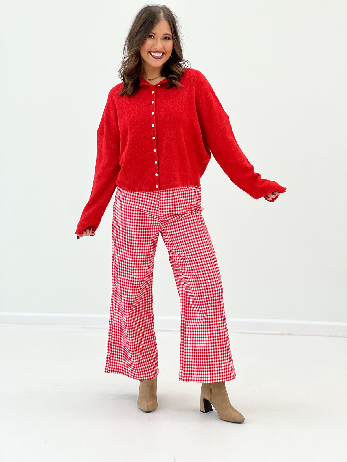 Red button-front long-sleeve cardigan with point collar and full-length sleeves