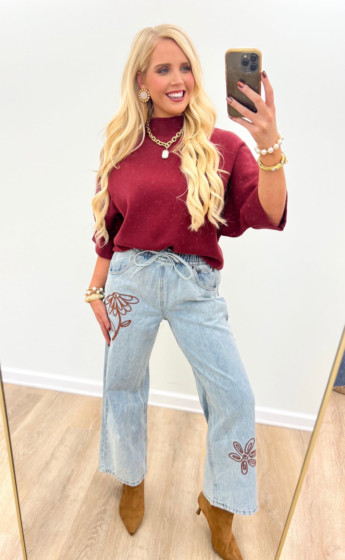 Burgundy mock-neck pullover sweater with draped short sleeves