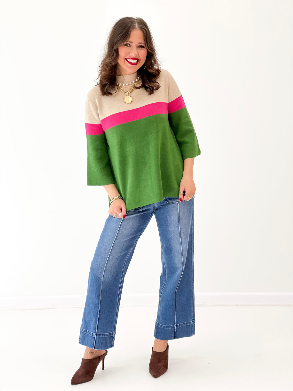 Beige, green, and pink color-block mock neck sweater with relaxed fit