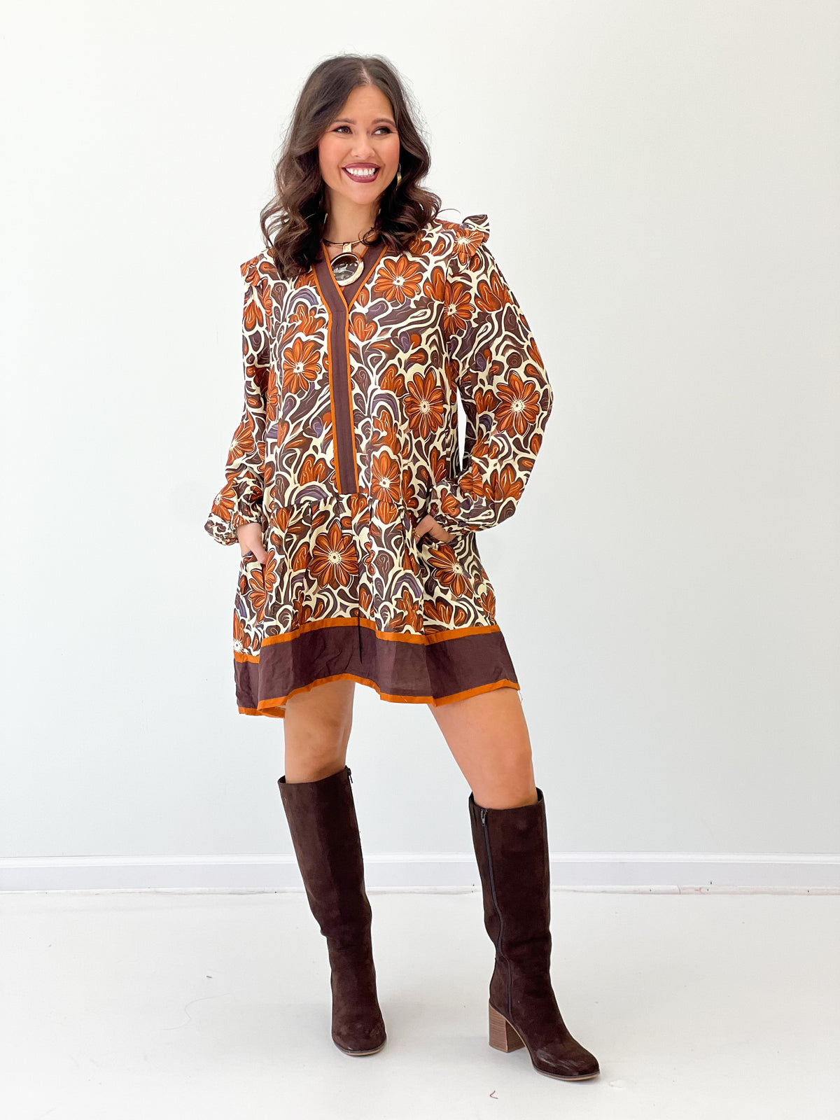 Brown floral V-neck ruffle dress with long puff sleeves and button-front