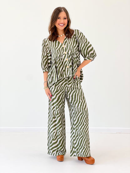 Olive zebra-print button-front puff sleeve top with V neckline, full view