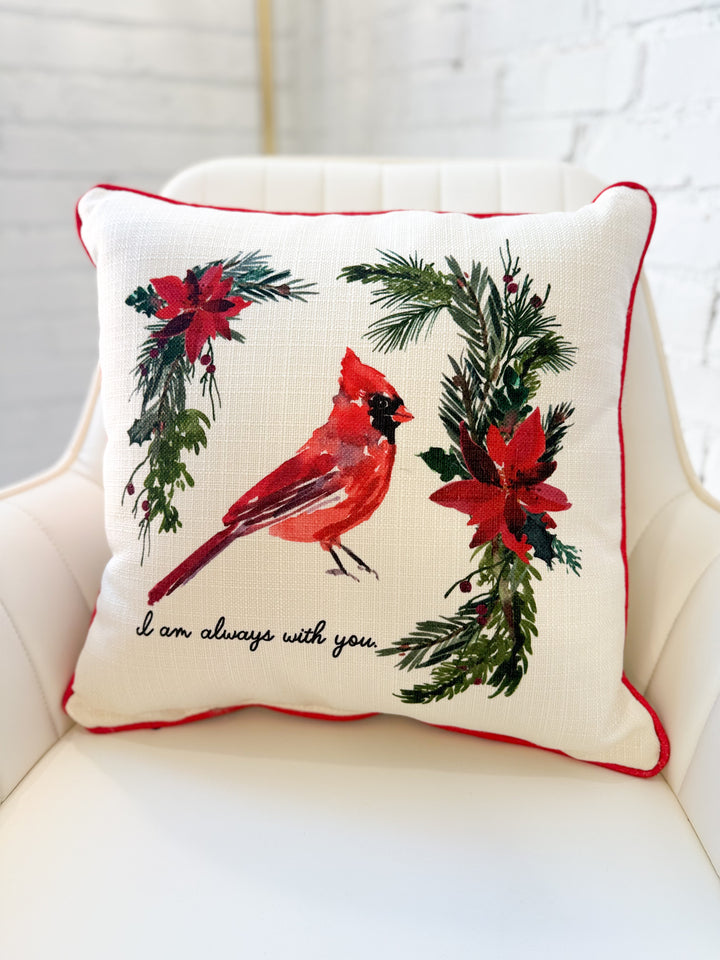 Cardinal throw pillow with cream cover, red cardinals, green foliage wreath, red piping