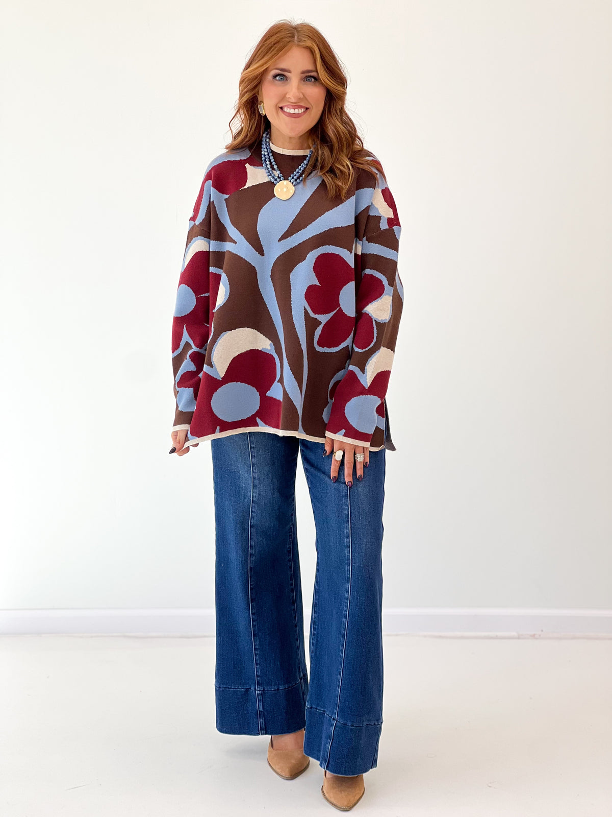 Brown, red, and cream floral print long-sleeve crewneck sweater top, relaxed fit