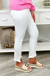 White Mid Rise Fray Hem Skinny Jeans