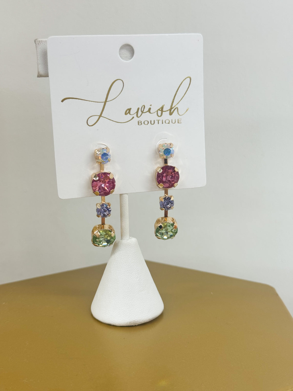 Crystal linear drop earrings with four gems in blue, purple, green and pink