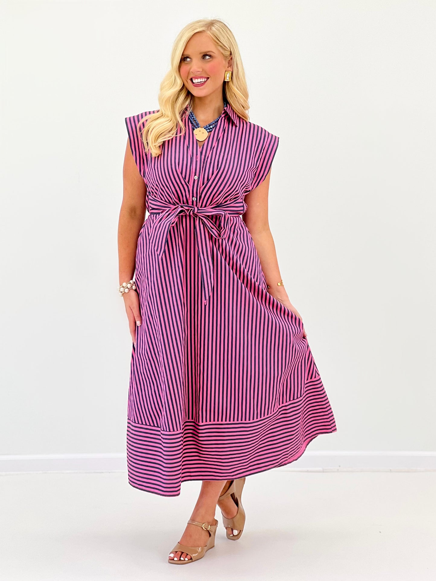 Purple striped belted midi dress with sleeveless V-neck and gathered skirt