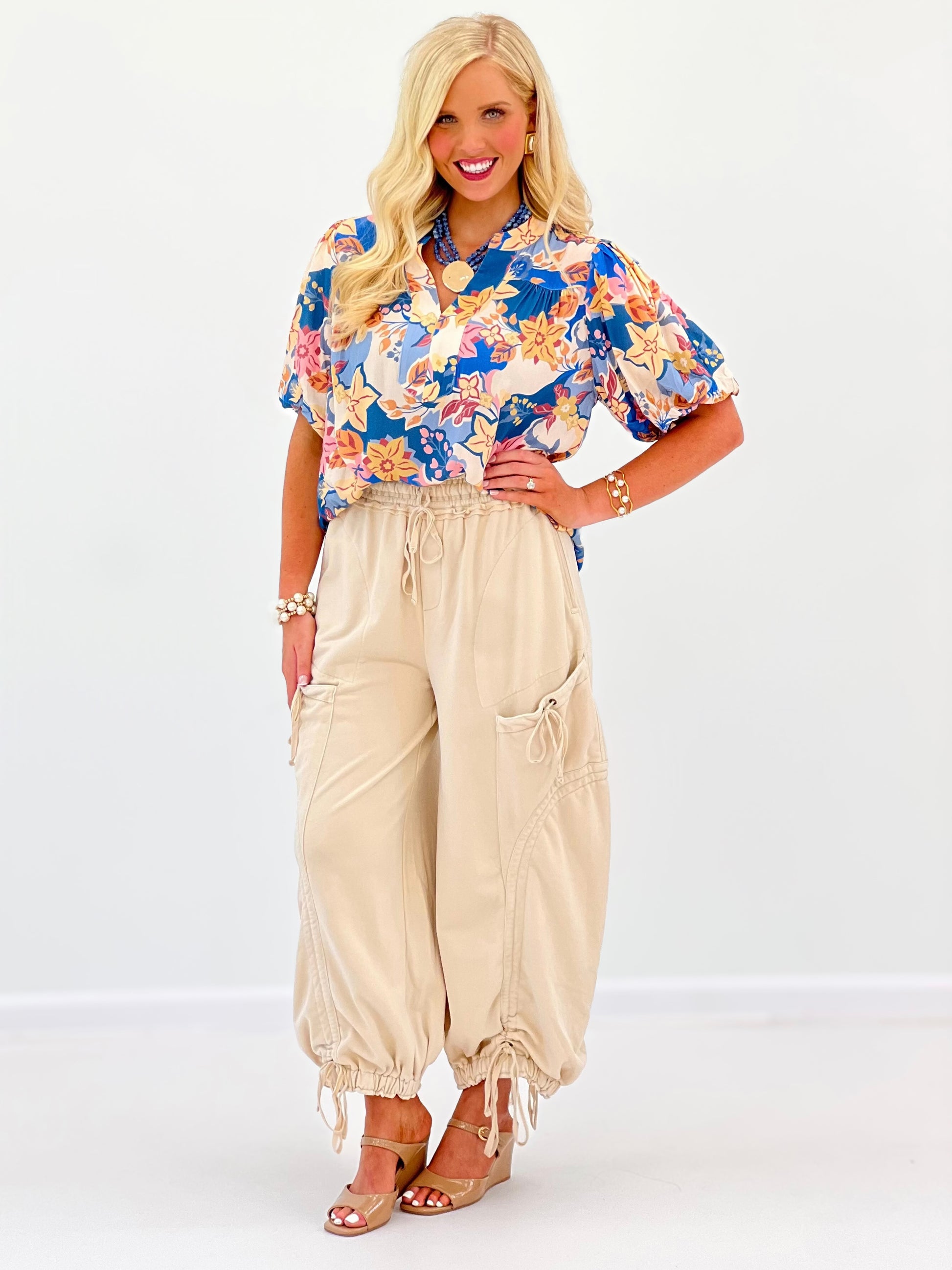 Dusty blue floral puff-sleeve V-neck top with elastic waist