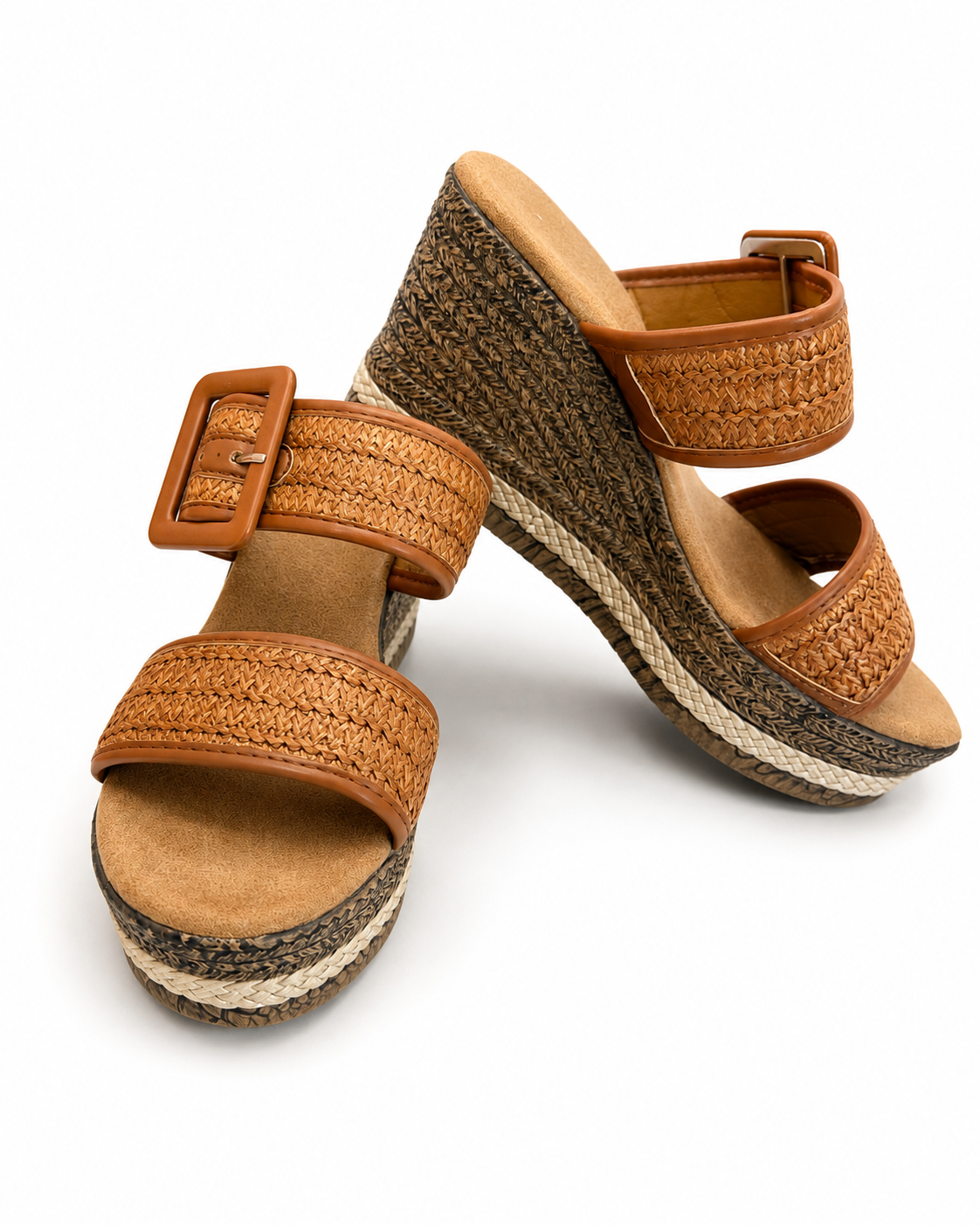 Raffia wedge sandals side view with tan buckle strap and textured platform sole