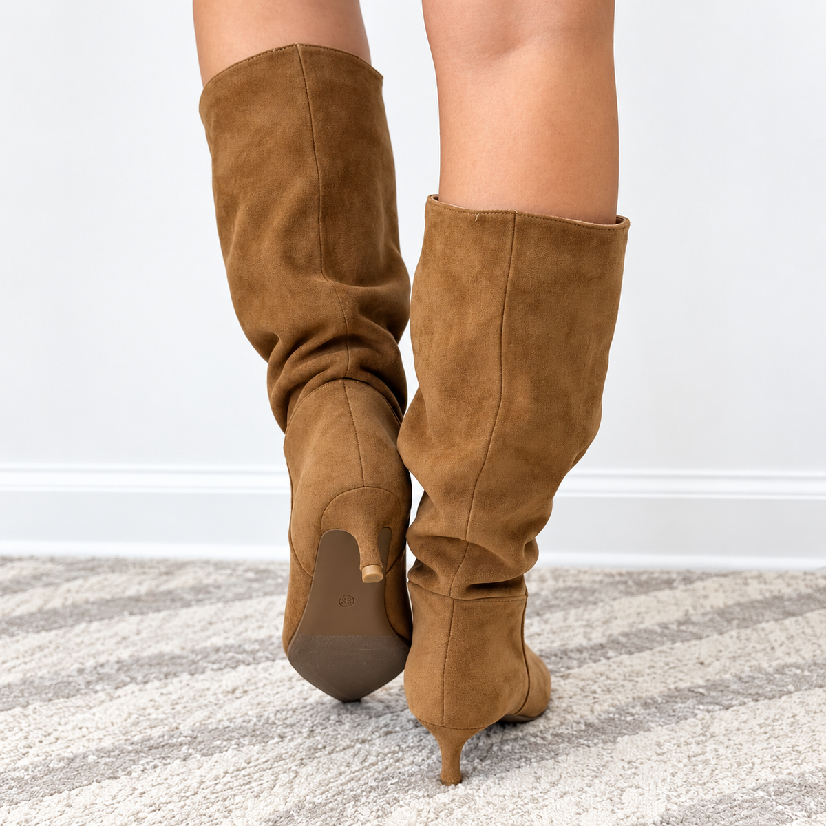 Corky's Company camel suede party boots, back view with stiletto heel and seam details