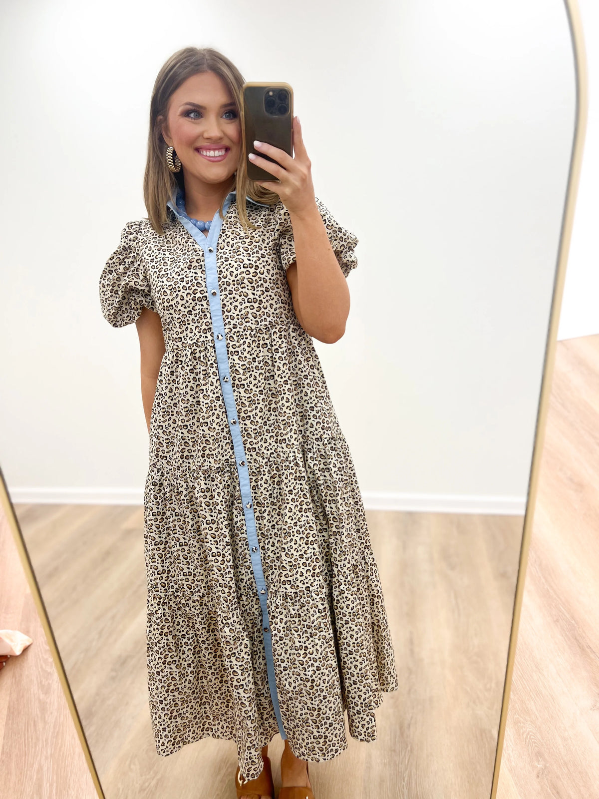 Animal-print puff sleeve dress with blue button placket and Peter Pan collar