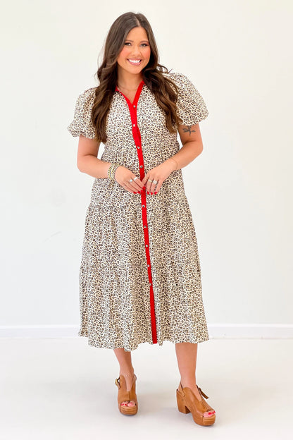 Animal-print puff sleeve dress with red button placket and Peter Pan collar