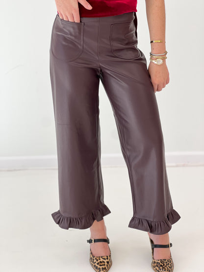 Deep fig pleather pants with front pockets and ruffled ankle hem