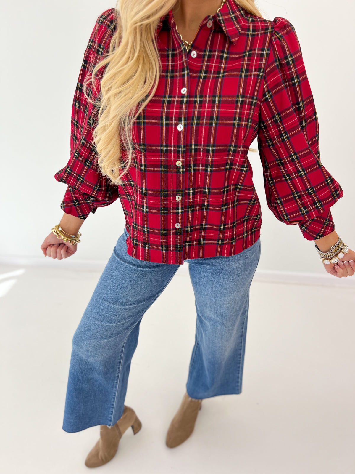 Red plaid stretch knit top with collar and button front, puff sleeves, long cuffs
