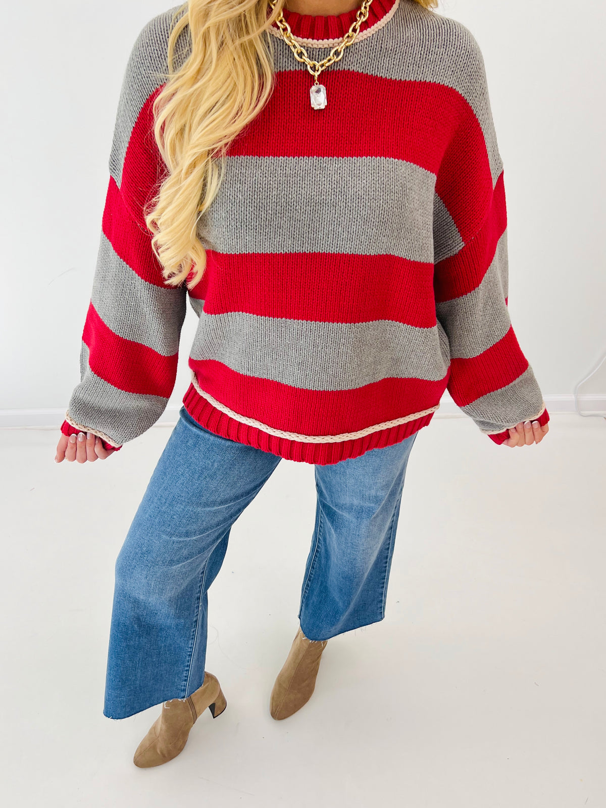 Oversized crew neck sweater in red and gray wide stripes with ribbed cuffs and hem