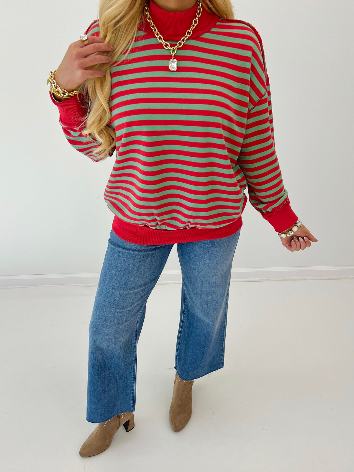Red and green striped mock neck terry top with long sleeves and ribbed cuffs