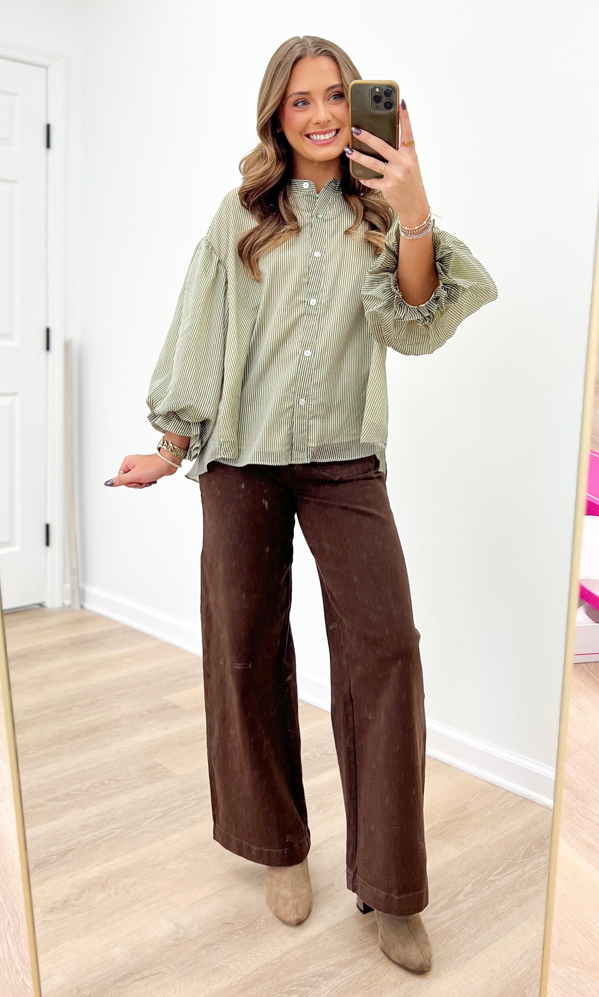 Olive green pinstripe bubble-sleeve blouse with button front and voluminous sleeves