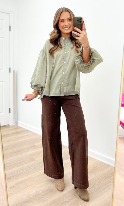 Olive green pinstripe bubble-sleeve blouse with button front and voluminous sleeves