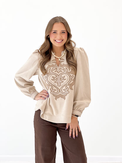 Stone faux suede look long-sleeve top with hamsa-style embroidered front