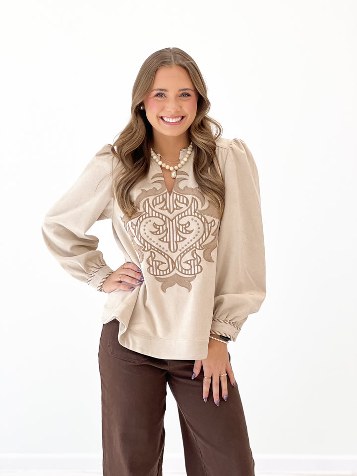 Stone faux suede look long-sleeve top with hamsa-style embroidered front