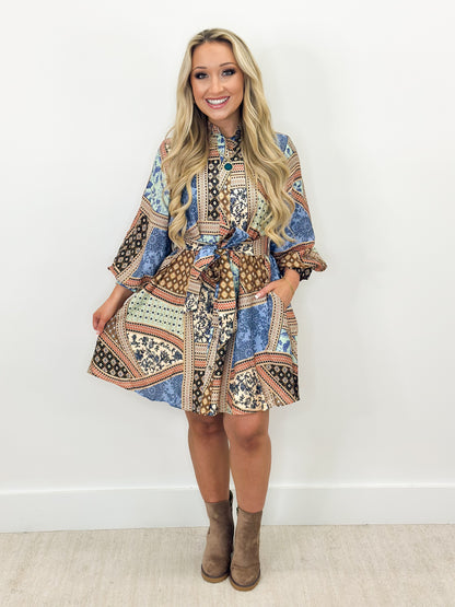 Patchwork print belted mini dress with long sleeves and button placket