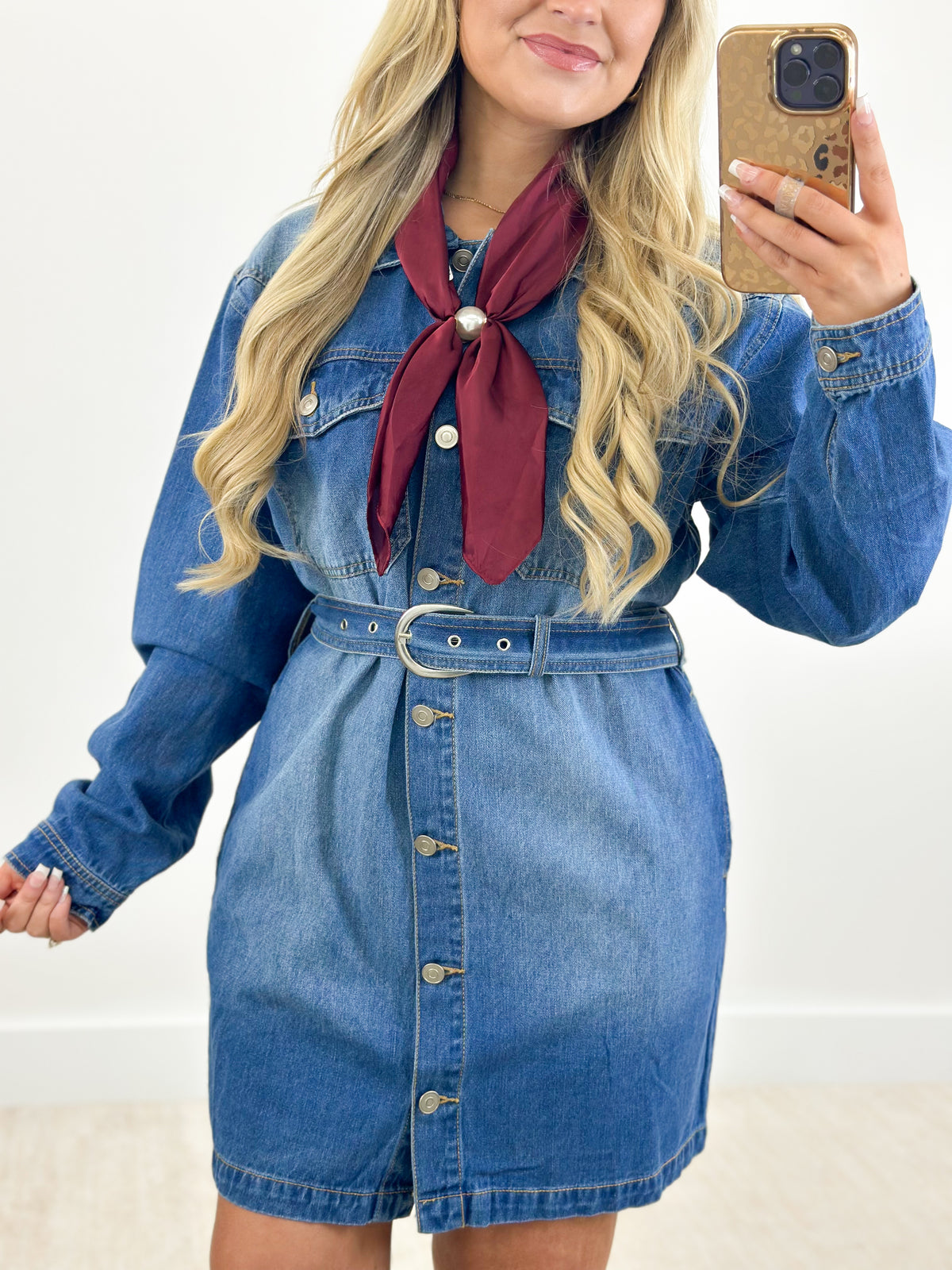 Medium blue denim belted shirt dress with button front and neck tie