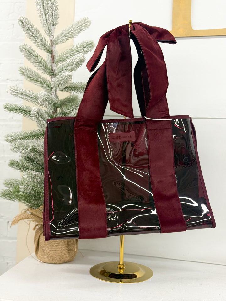 Case-Mate red velvet tote bag with glossy transparent panels and wide shoulder straps
