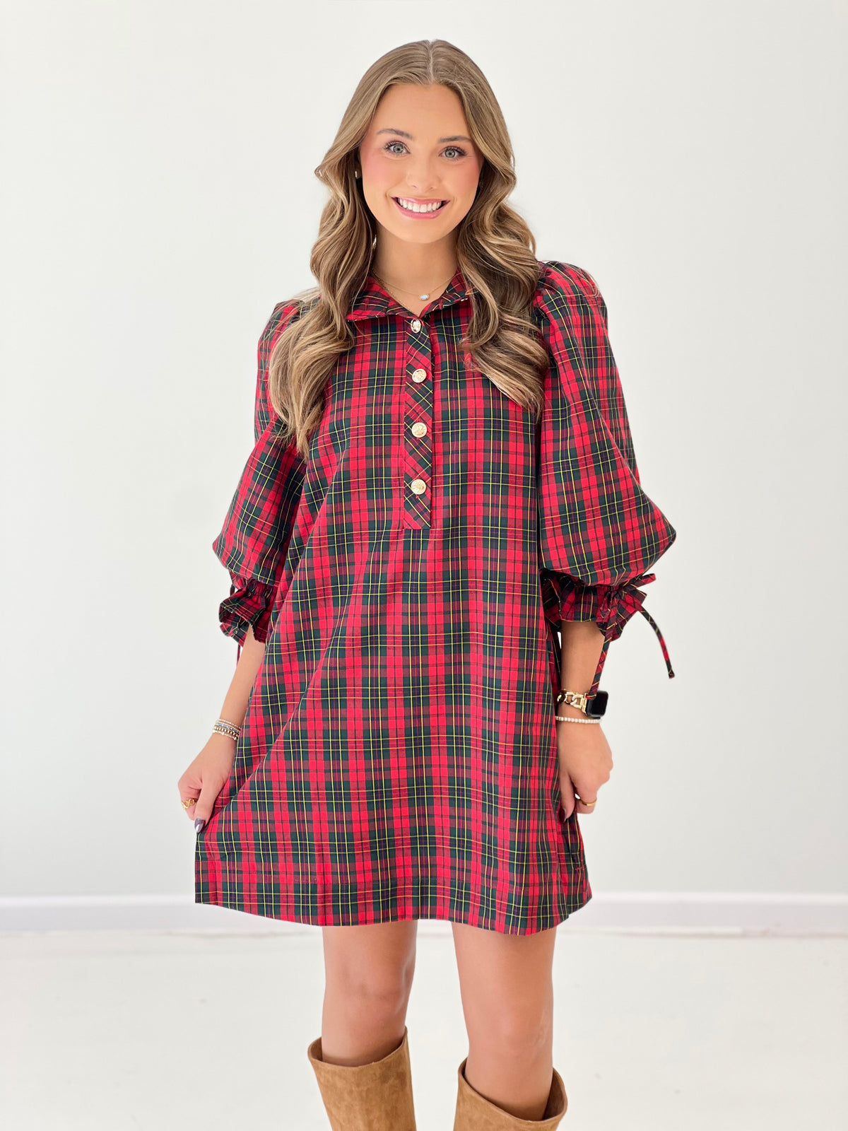Red plaid collared mini dress with balloon sleeves and button front.