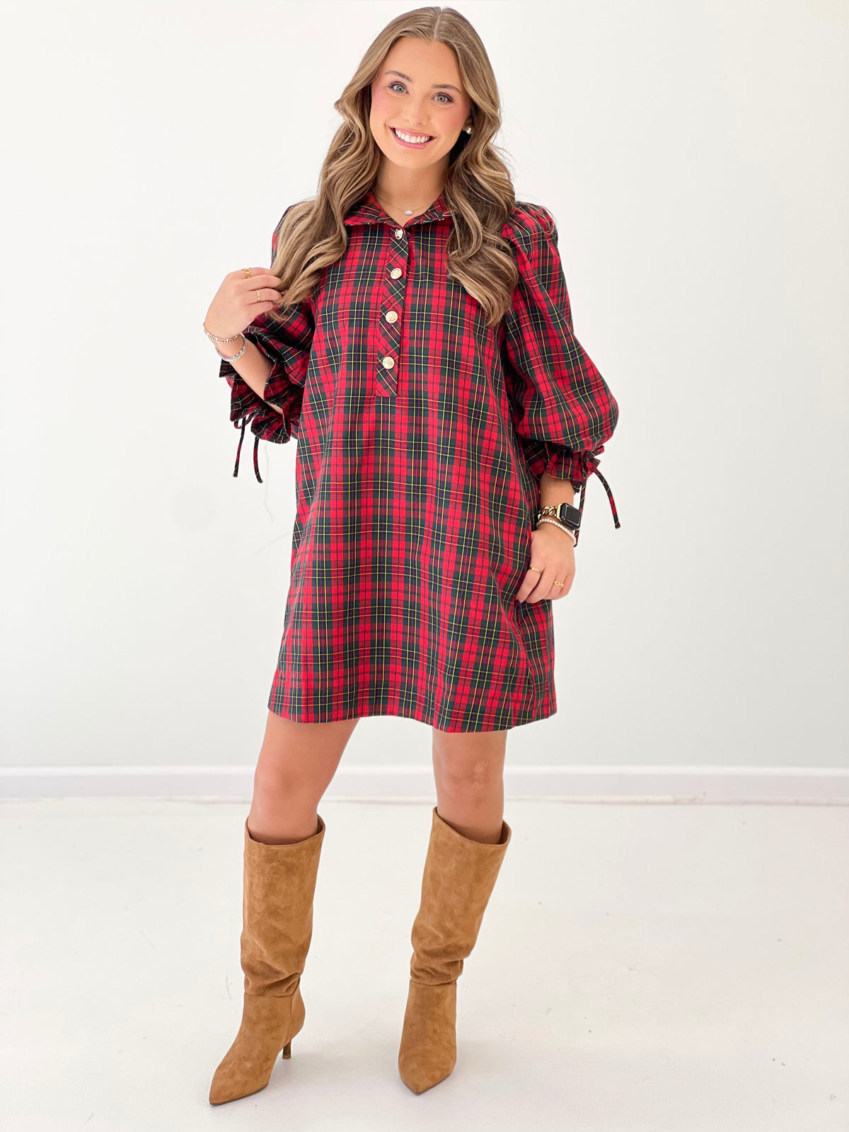 Red plaid mini dress with tie-cuff balloon sleeves and button front.