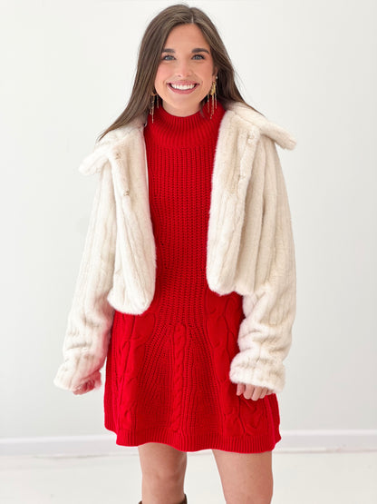 Cream faux fur crop jacket with oversized collar, open front and long sleeves