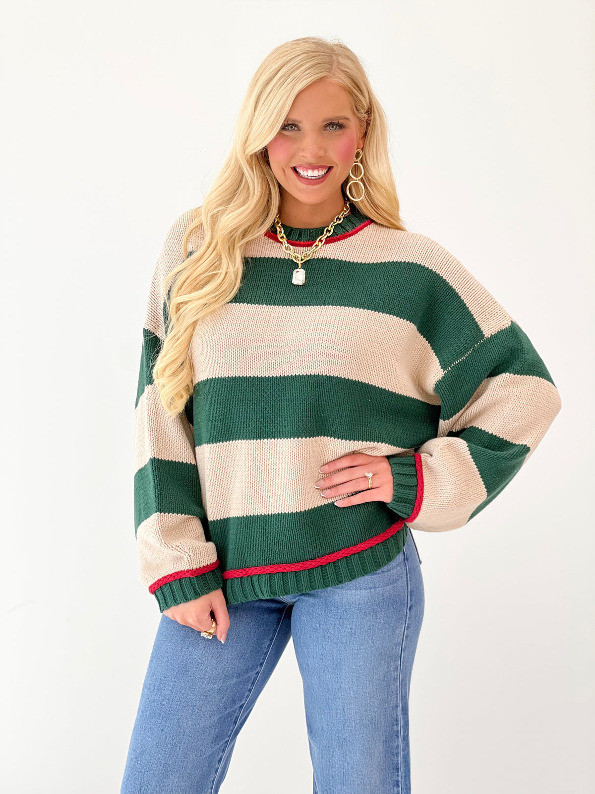 Oversized crew neck long sleeve sweater in green and oatmeal stripes with ribbed trim