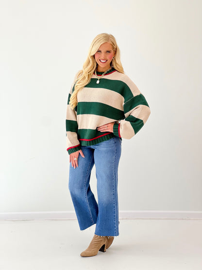 Oversized crew neck long sleeve sweater in green and cream with bold horizontal stripes