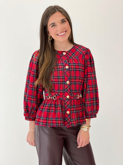 Red plaid peplum top with puff sleeves, front buttons, and waist belt detail