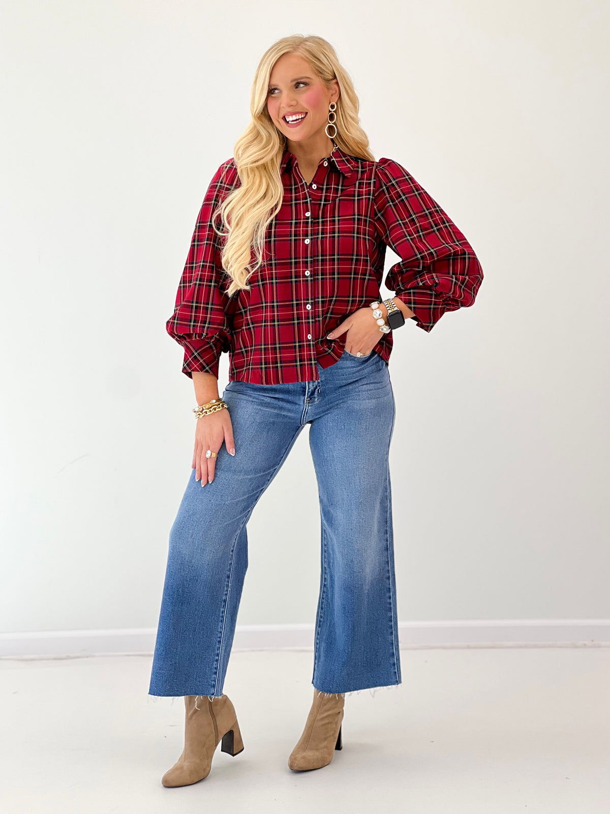 Red plaid stretch knit button-up top with stand collar and voluminous puff sleeves