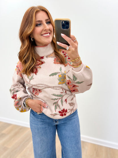 Beige floral jacquard mock neck sweater with long sleeves and allover botanical print