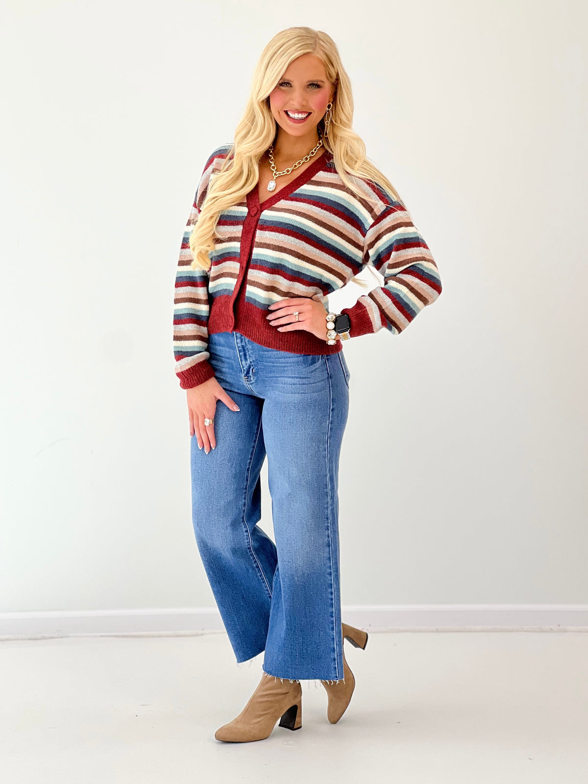 Cropped button-front cardigan with multicolor stripes and burgundy V-neck, long sleeves