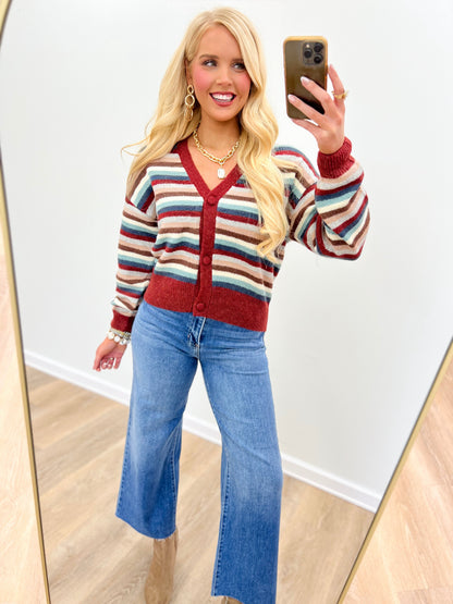 Cropped button-front cardigan with multicolor horizontal stripes and burgundy V-neck