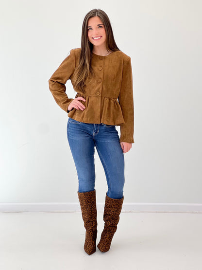 Camel peplum hem jacket with button front and long sleeves, round neckline