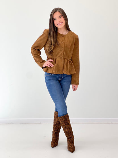 Camel peplum button-front jacket with long sleeves and curved hem