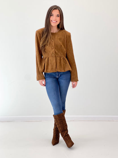 Camel peplum hem button-front jacket with long sleeves and round neckline