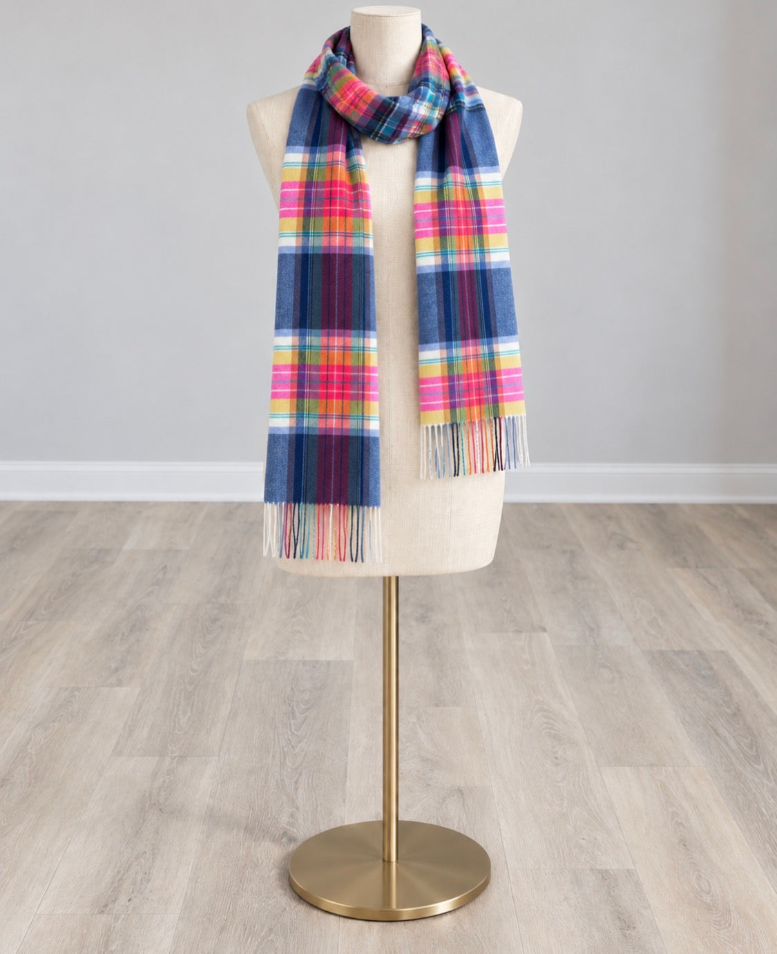 Madras plaid blanket scarf in navy with colorful stripes and fringed ends