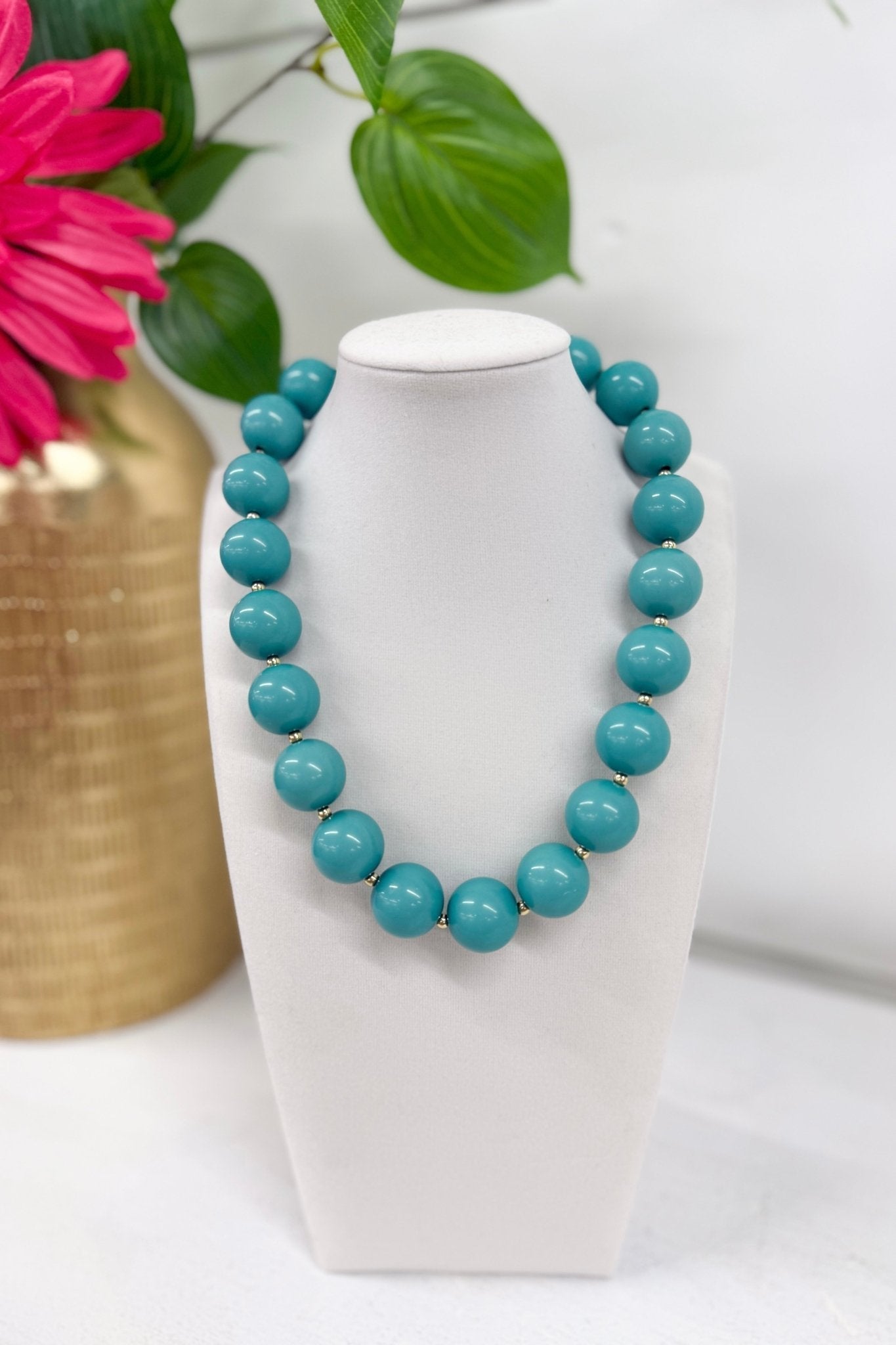 Colored acrylic ball necklace on a link chain