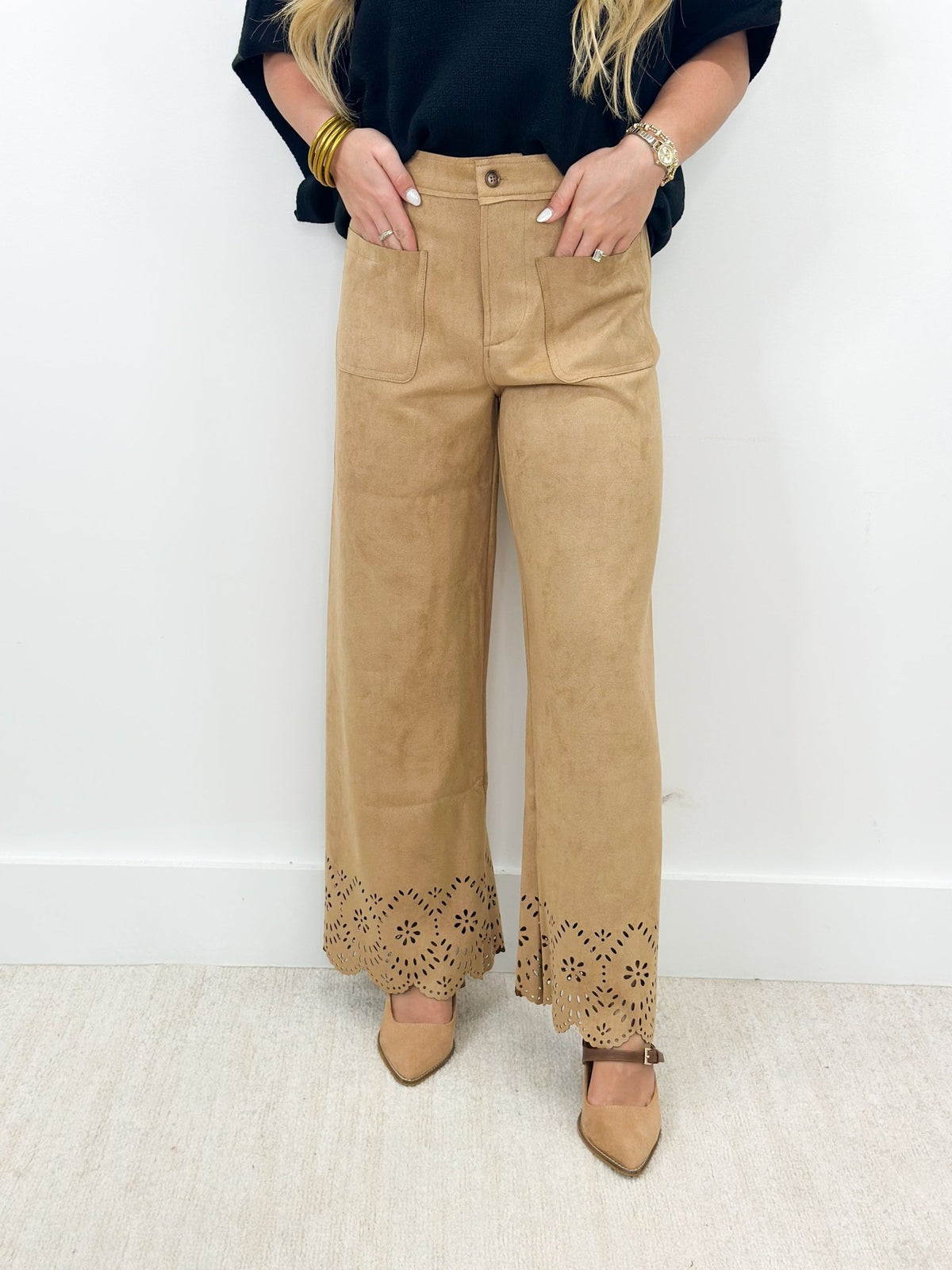 Faux suede pants with laser cut detailing down the leg